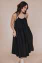 La petite robe noire à bretelles en cupro